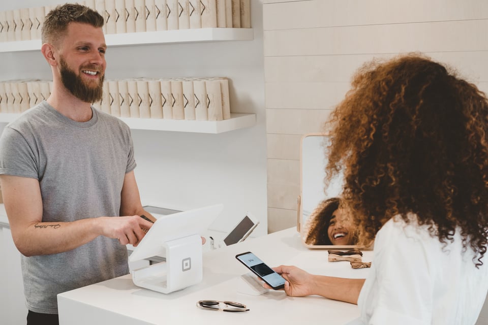 An eCommerce store owner making a sale. 