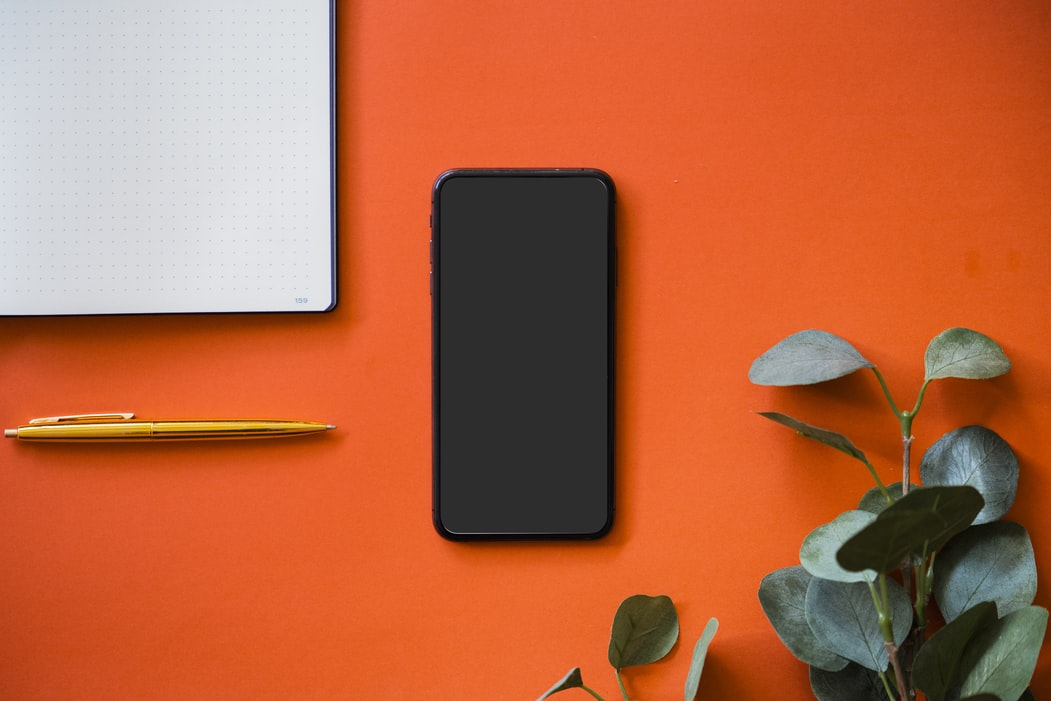 Cellphone on a red background