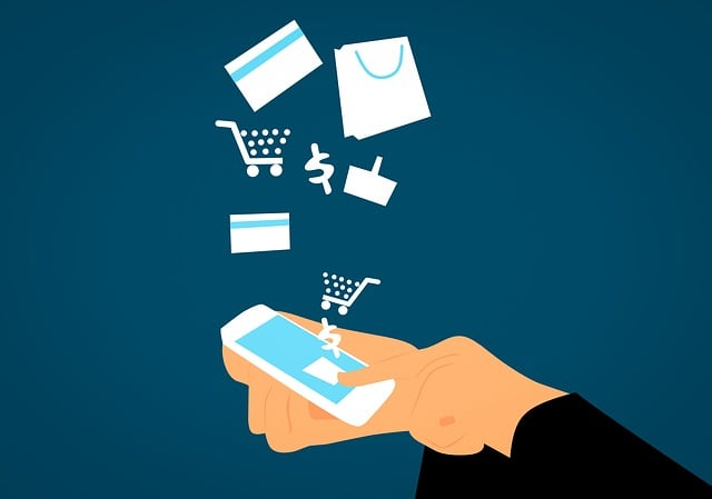 Hands holding smart phone with illustrated shopping icons floating above it