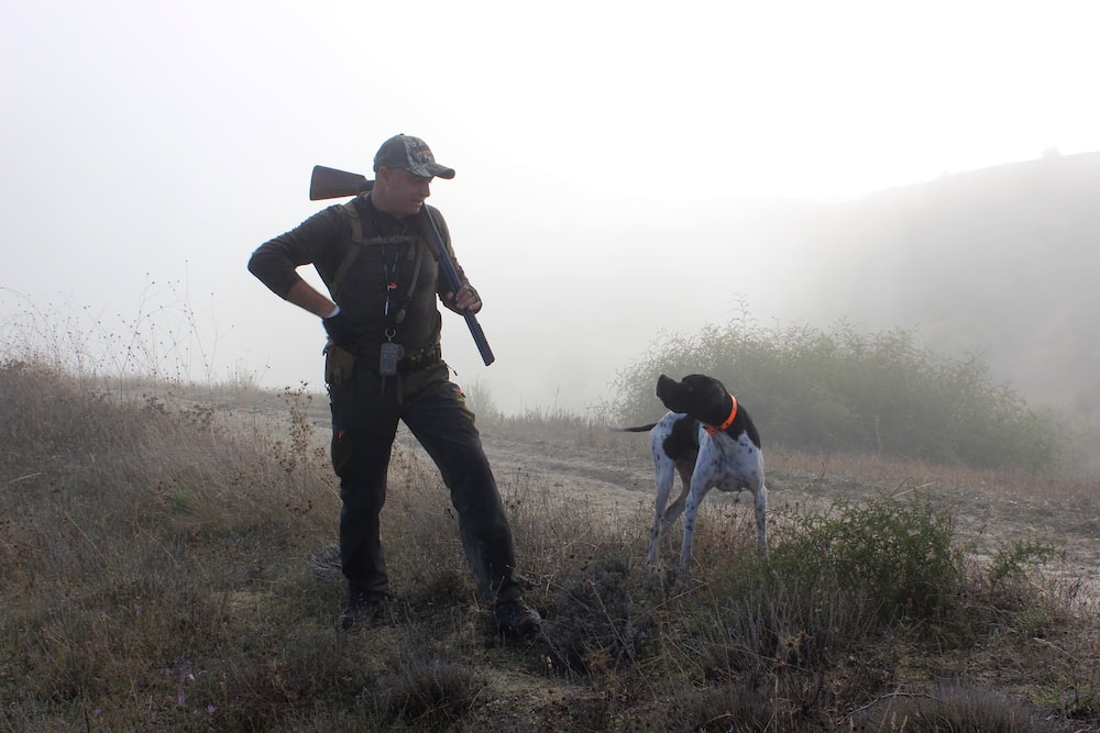 A hunter with his dog.