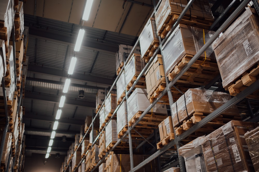 Warehouse shelves stacked full of boxes