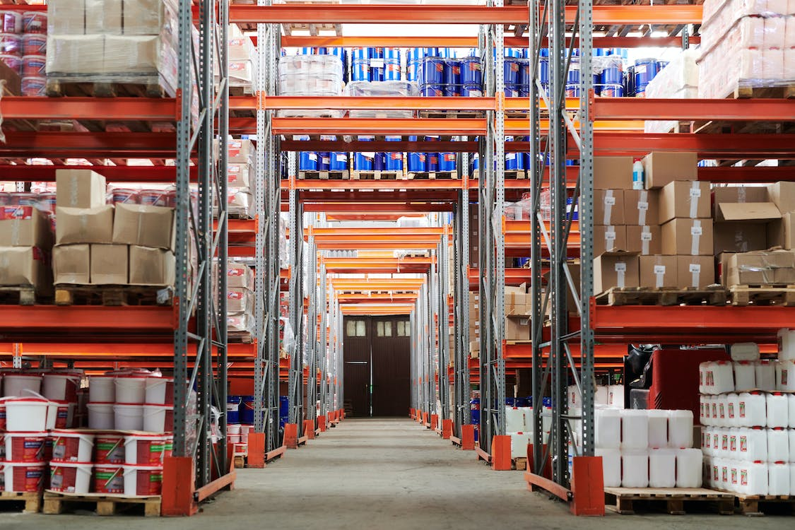 Warehouse with stacked shelves