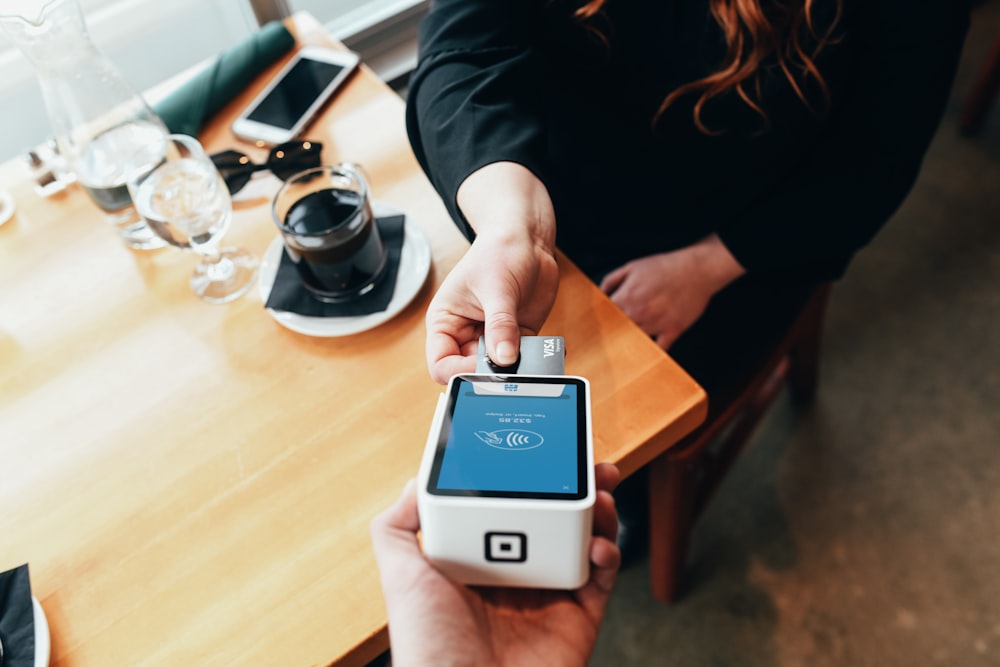 Paying with a credit card. 