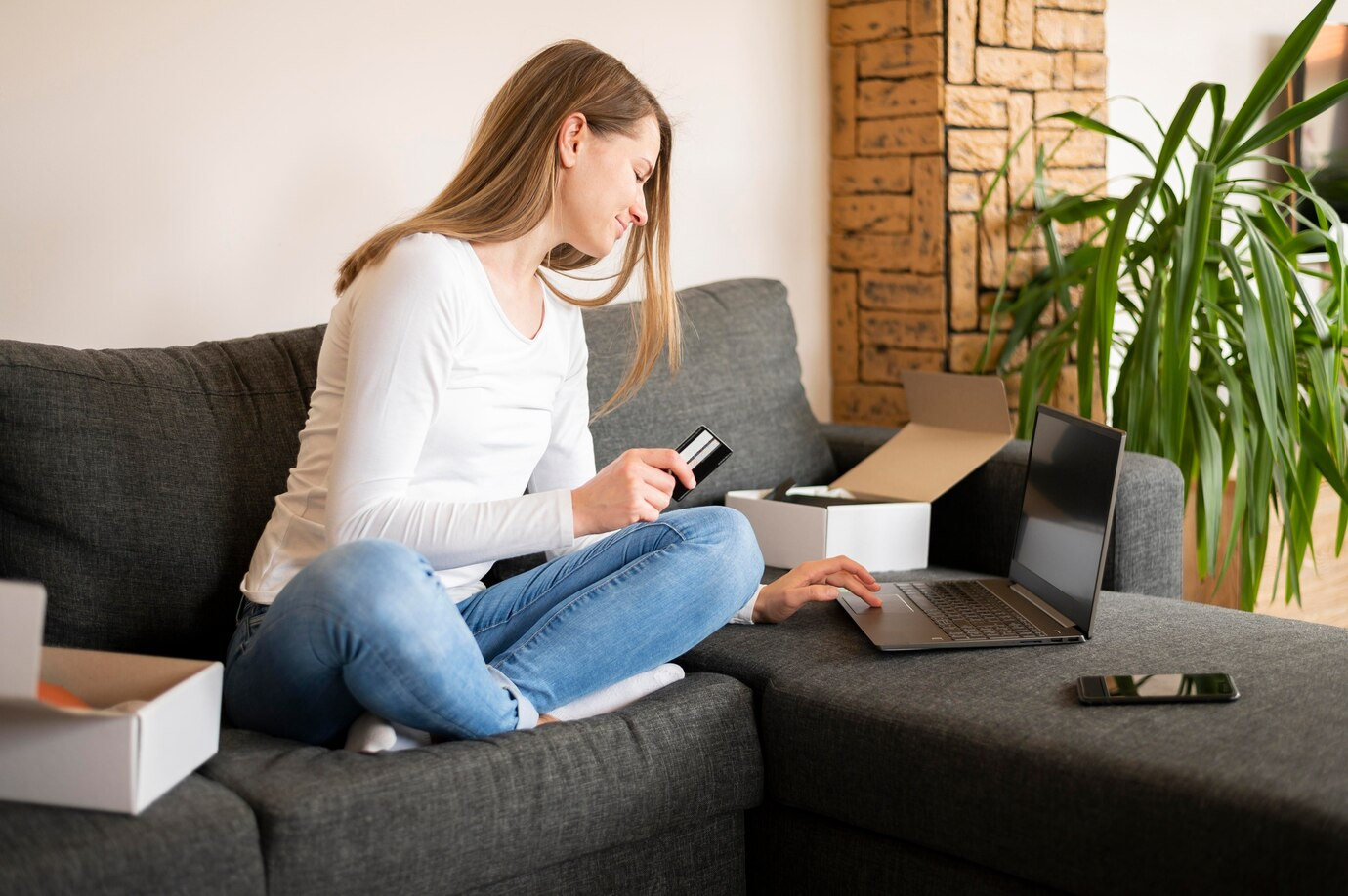 Person placing an order from an eCommerce store on laptop