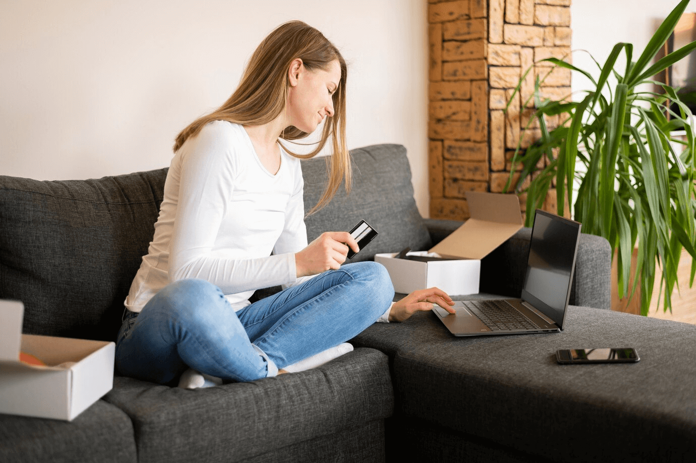 Person placing an order from an eCommerce store on laptop