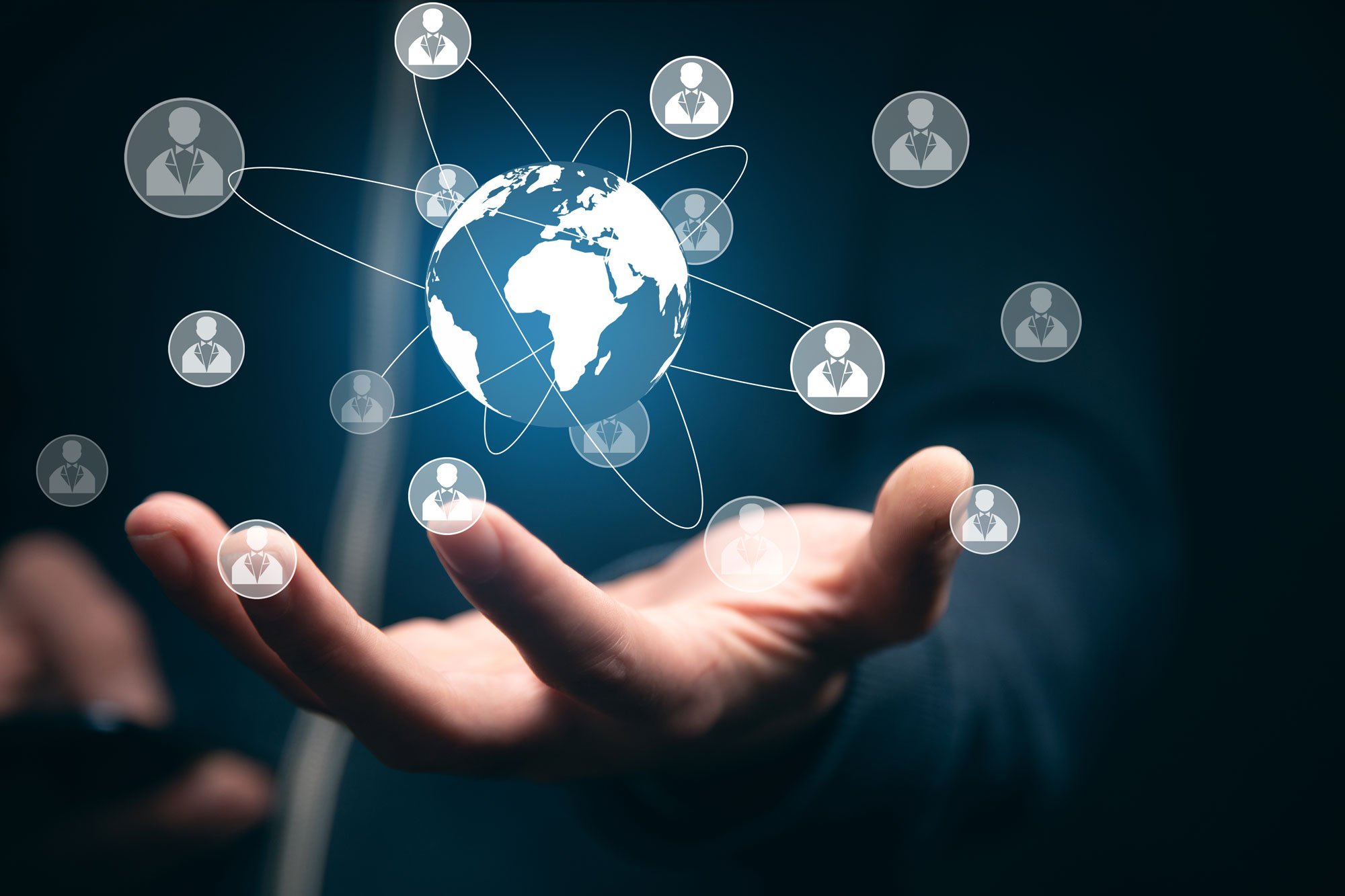 man-holding-smart-phone-with-global-social-network